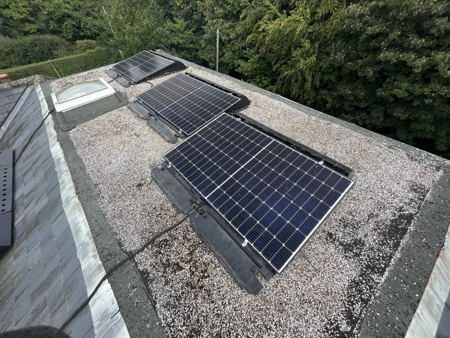 Three solar panels on residential roof