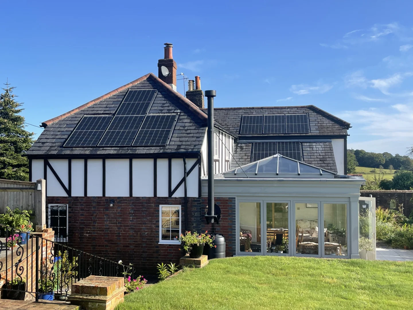 Solar panels on large residential home on multiple roofs