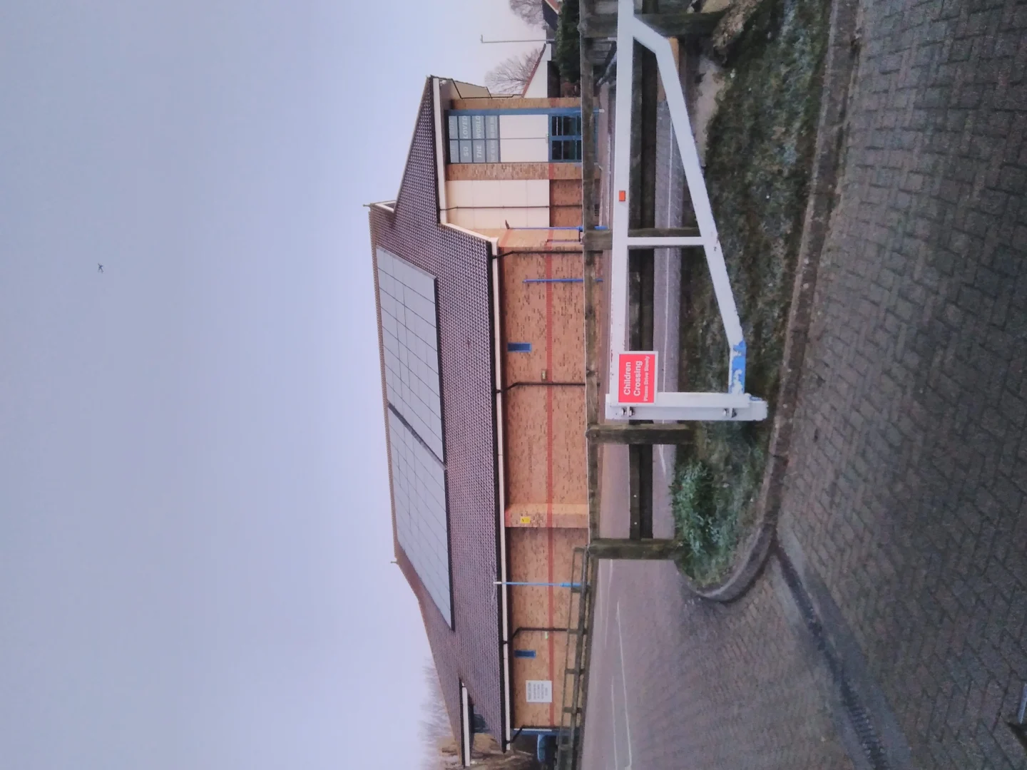 Multiple solar panels on roof of King’s Church, Chessington