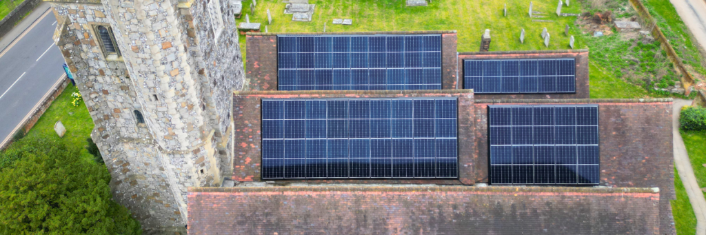 Aerial view of church with solar panels