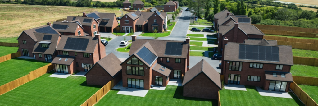 An image of a property development with solar panels