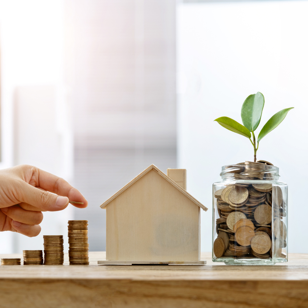A house and a stack of pennies